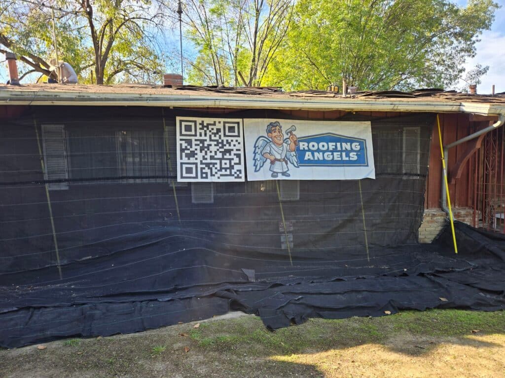 Residential roof installation with catchall system to protect landscaping by Roofing Angels in Los Angeles, CA